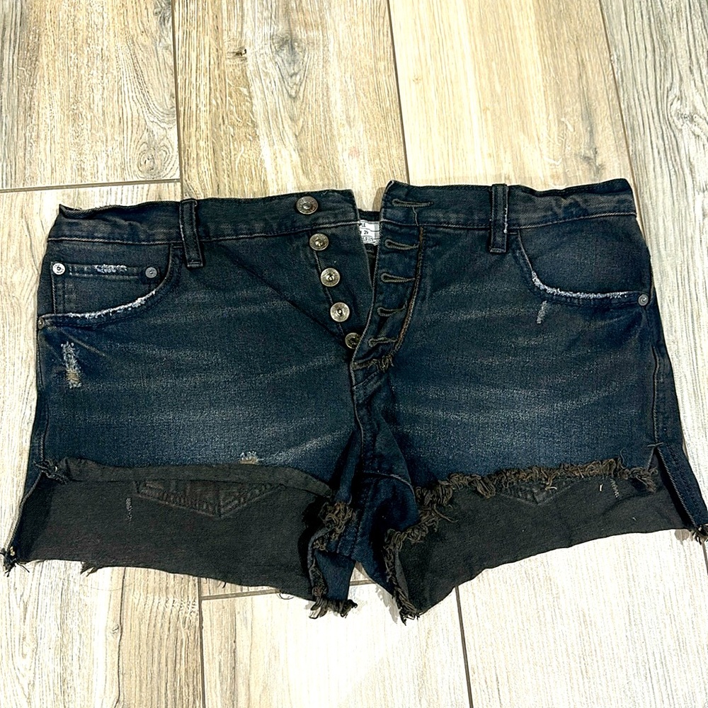 Free people black distressed denim shorts